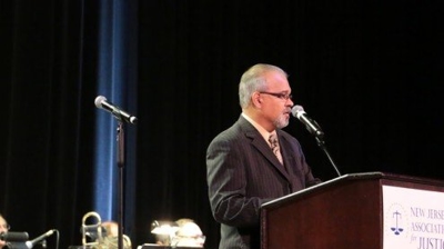 Pastor Ben Ocasio speaking at the installation dinner. Photo